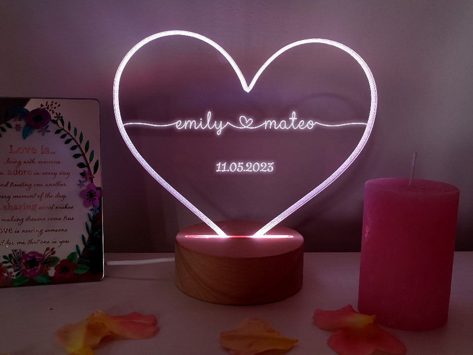 Heart-shaped night lamp with multicolour LED lights, remote control, and powered by USB cable or batteries.