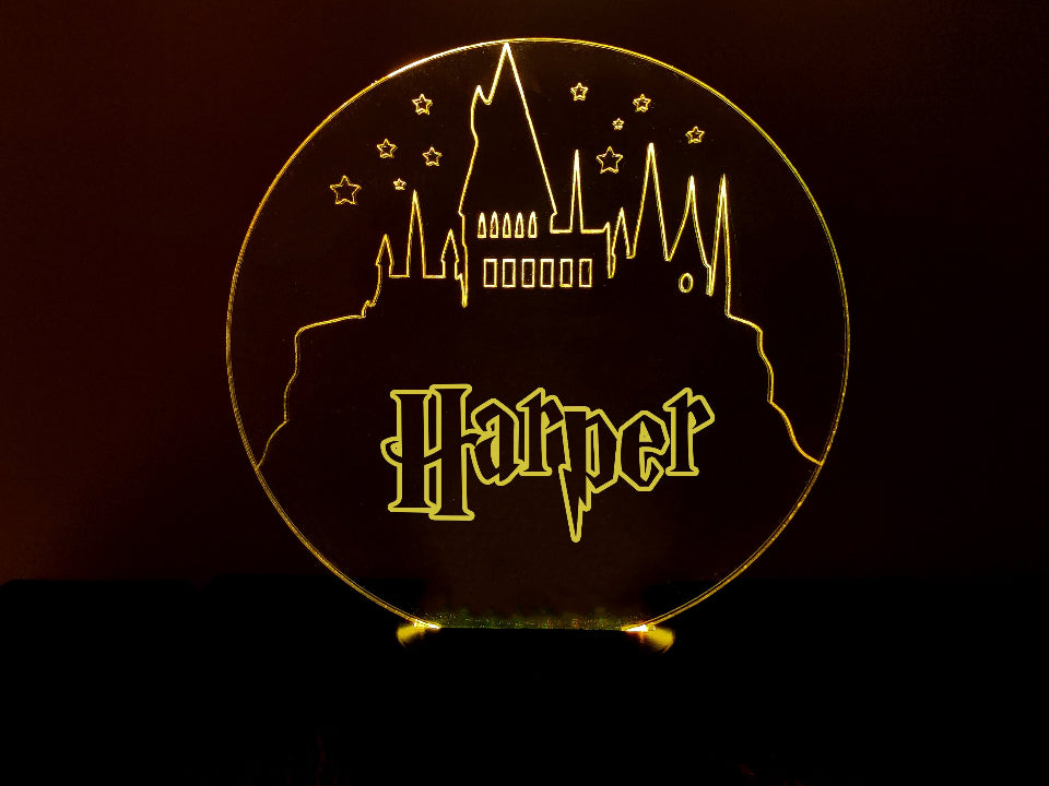 LED night lamp of Harry Potter castle, featuring multicolor light, USB or battery powered, with a controller for settings.
