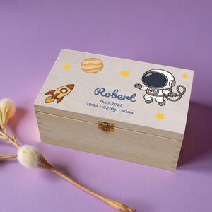 Wooden box with space-themed design and name 'Robert' on a purple background