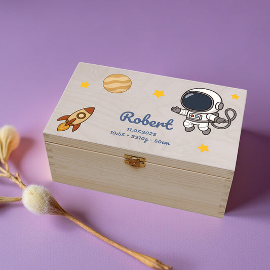 Wooden box with space-themed design and name 'Robert' on a purple background