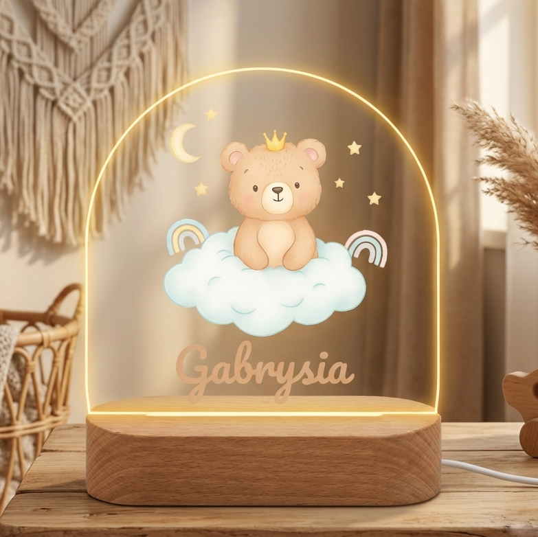 Decorative lamp with a teddy bear design on a wooden table.