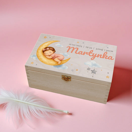 Wooden box with a baby illustration and name 'Martynka' on a pink background